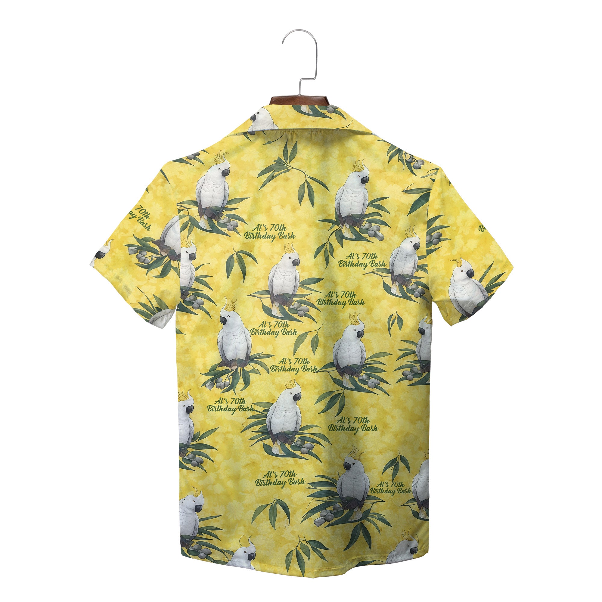 Yellow camp shirt featuring white crested parrots on green foliage variant 2
