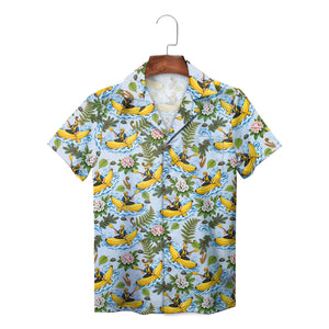 Blue aloha shirt featuring banana kayak rafting print