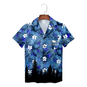 Blue palm leaf shirt with white blooms team logo