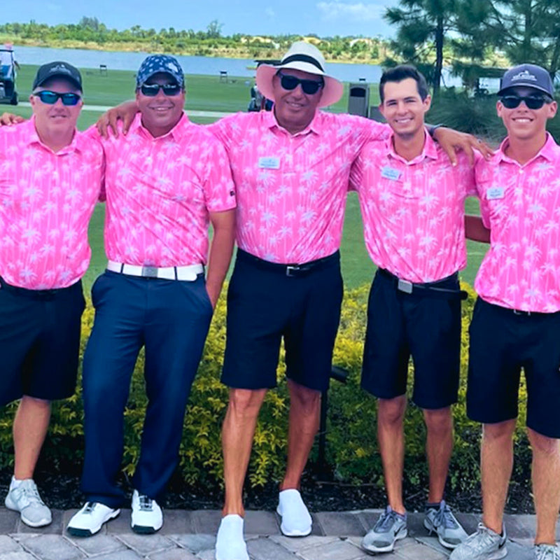 Group wearing custom polo shirts outdoors