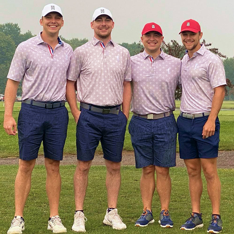 Team wearing matching polo shirts on golf course