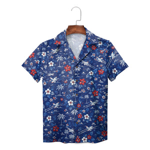 Blue aloha shirt featuring jets, hibiscus blooms, palms