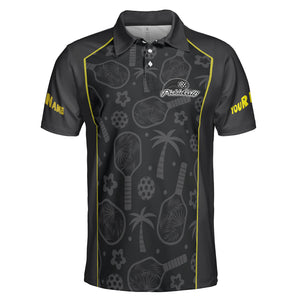 Dark gray pickleball polo with palm paddle pattern yellow trim