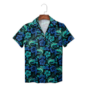 Black aloha shirt showing green shark heads teal blossoms