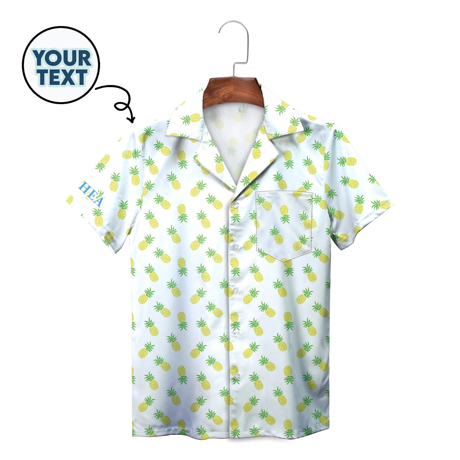 White Hawaiian shirt with yellow pineapple pattern on hanger