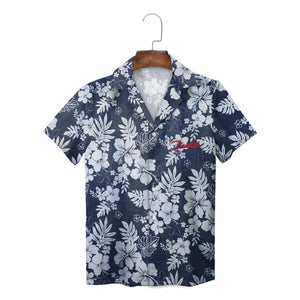 Indigo aloha shirt showing white hibiscus monstera print