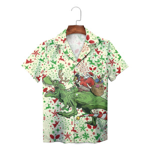 Green T Rex dinosaur carrying Santa Claus Christmas shirt