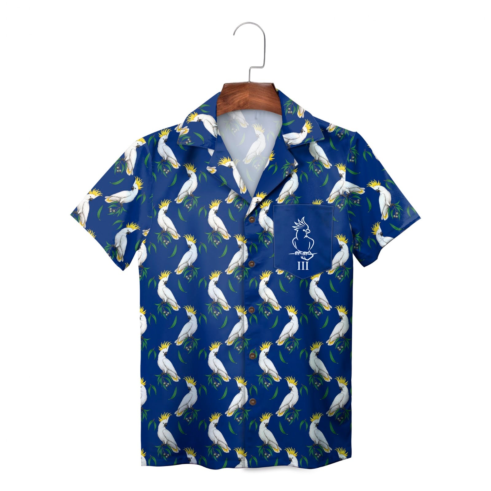 White cockatoos on blue short sleeve shirt on hanger