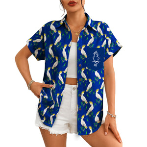 White cockatoos on blue short sleeve shirt on hanger variant 4