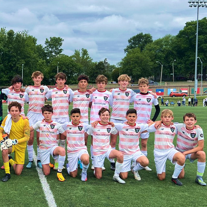 Teen soccer team in matching jerseys