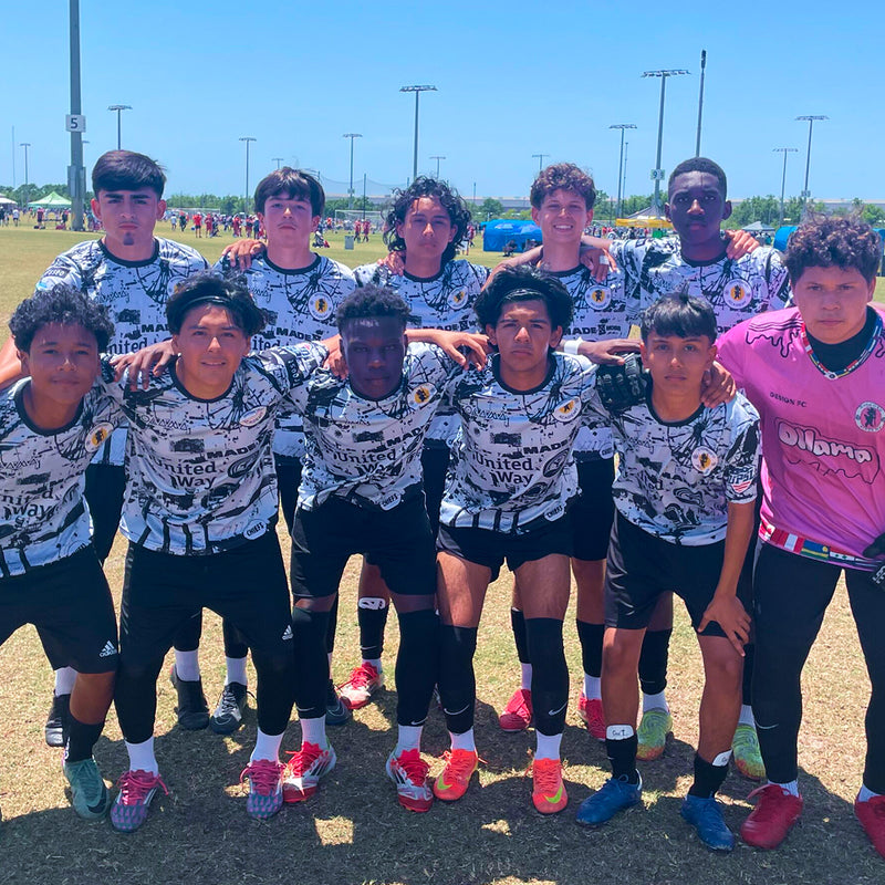 Teen soccer team in matching jerseys